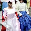 Rudolph Brown/Photographer
 Scotiabank staff Cornelia Ceough (left) and Martine Nelson, walk the red carpet during the bank's celebration of 120 years in Jamaica at the King  Street Branch on Monday, December 14.