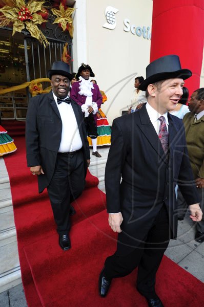 Rudolph Brown/Photographer
Bruce Bowen, (right) President and CEO of Scotiabank Group Jamaica chat with Michael Shaw, (left) Scotiabank Kings Street branch Manager before the official opening of the Bank, during the Scotiabank Jamaica celebrating 120 years in Jamaica from 1889 to 2009 at the Kings Street Branch on Monday, December 14-2009