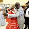 Rudolph Brown/Photographer
Mayor of Kingston Desmond McKenzie dances with Joan Badson Mignott while Bruce Bowen (right), president and CEO of Scotiabank Group Jamaica and Michael Shaw (second right), Scotiabank Kings Street branch manager, look on as Scotiabank celebrates 120 years in Jamaica at the Kings Street Branch, downtown Kingston yesterday. To mark the occassion, everyone wore vintage clothing from the 1880s.