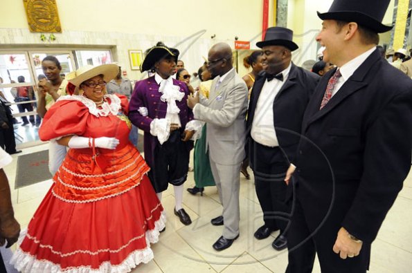 Rudolph Brown/Photographer
Mayor of Kingston Desmond McKenzie, (centre) chat with from left Joan Badson Mignott, Throy Laing, Michael Shaw, Scotiabank Kings Street branch Manager and Bruce Bowen, (right) President and CEO of Scotiabank Group Jamaica at the Scotiabank Jamaica celebrating 120years in Jamaica from 1889 to 2009 at the Kings Street Branch on Monday, December 14-2009