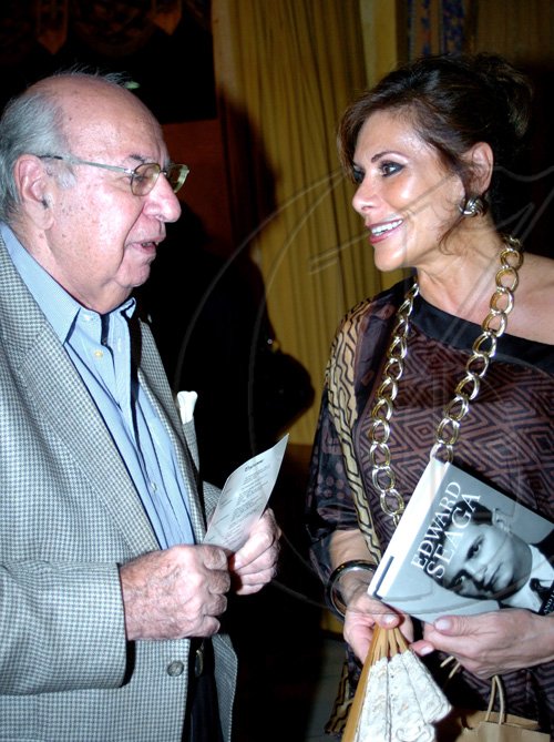 Winston Sill / Freelance Photographer
George Fatta and the Mexican Ambassador Leonora Rueda, talk literary matters at the launch of Edward Seaga book- "My Life And Leadership, volume one: Clash of Ideologies,1930--1980", held at Mona Visitor's Lodge, University of the West Indies campus on Wednesday.


********************************************************************************* March 3
, 2010. Here are George Fatta (left); and the Mexican Ambassador ??? (right).