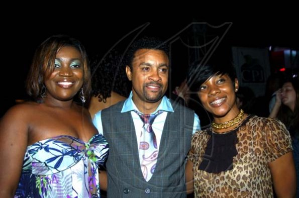 Winston Sill / Freelance Photographer
Shaggy smack in the middle of the two Red Stripe beauties, Marsha Lumley (left) and Renee Wong.


**********************************************************


Shaggy Foundation presents "Shaggy and Friends 2010  Concert", held on the lawns of Jamaica House, Hope Road on Saturday night January 2, 2010.