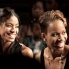Yendi Phillips (left) and Ann-Merita Golding give an appreciative second glance to Earl Turner's BIGGY collection as it struts down the runway at Caribbean Fashionweek.