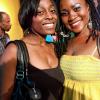 These two lovelies show off their patriotic black, green and gold spirit at the JCDC Jamaica Festival Launch.