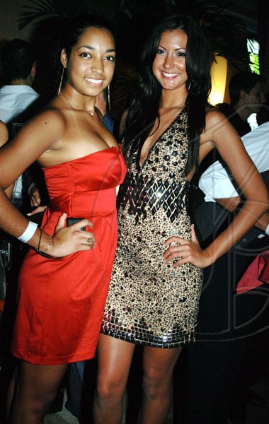 Janet Silvera Photo
 
Miss Jamaica World 2009, Kerrie Baylis (right) and her friend Shannon McClure looking swell as they rang in the New Year at Blue Beat's 'Soiree Bourgeoisie' 18th century French-themed party last Thursday night in Montego Bay.