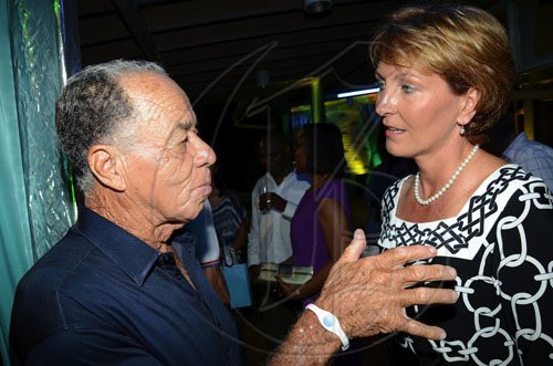 ContributedLindy Delapenha (left) has the attention of Rowena Connor  during the Sterling Asset Management Welcome Cocktails.