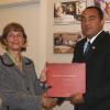 Contributed                                                                                                                                                                  Chief of Communications Services at the Canadian Dairy Commission,  Chantal Paul (left), presents a copy of a book on the history of the Commission to Minister of Agriculture and Fisheries, Hon. Dr. Christopher Tufton  (right), ), when the Minister and his team visited the
Commission, recently.