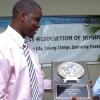 Peta-Gaye Clachar/Freelance Photographer
Member of the Executive Committee Mr. darain Luton (left) makes a presentation of an award to Ken Dawson Videographer formerly at TVJ for his outstanding contribution and service at a Veterans' Luncheon hosted by the Press Association of Jamaica at the Girl Guides Association on Wednesday, December 2, 2009. Mr. Winston Sill Photographer at the Gleaner Company , Mr. Michael Gordon a Photographer at the Jamaica Observer and Mr. Ruddy Mattherson a Videographer were also honoured.